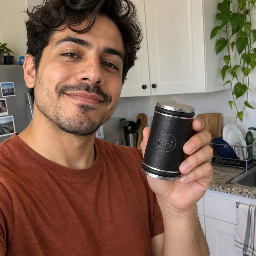 Illustrative lifestyle image of a person holding an Okura sharpener