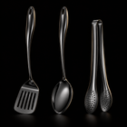Okura 3-piece utensil set in black, rounded handles, black studio