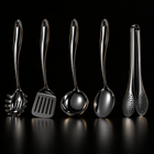Okura 5-piece utensil set in black, rounded handles, black studio