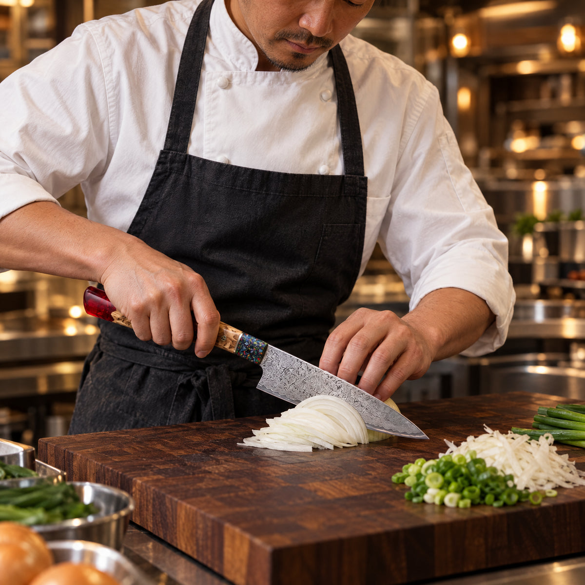 A Japanese chef using the Akatsuki Gyuto Chef Knife on a wooden cutting board in a professional kitchen
