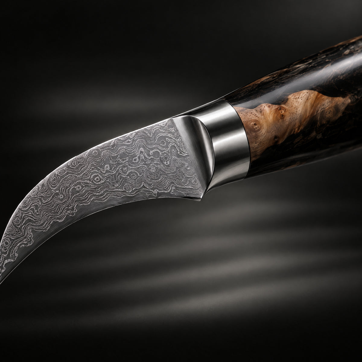 Close-up of the tsukikage bird's beak peeling knife blade and handle