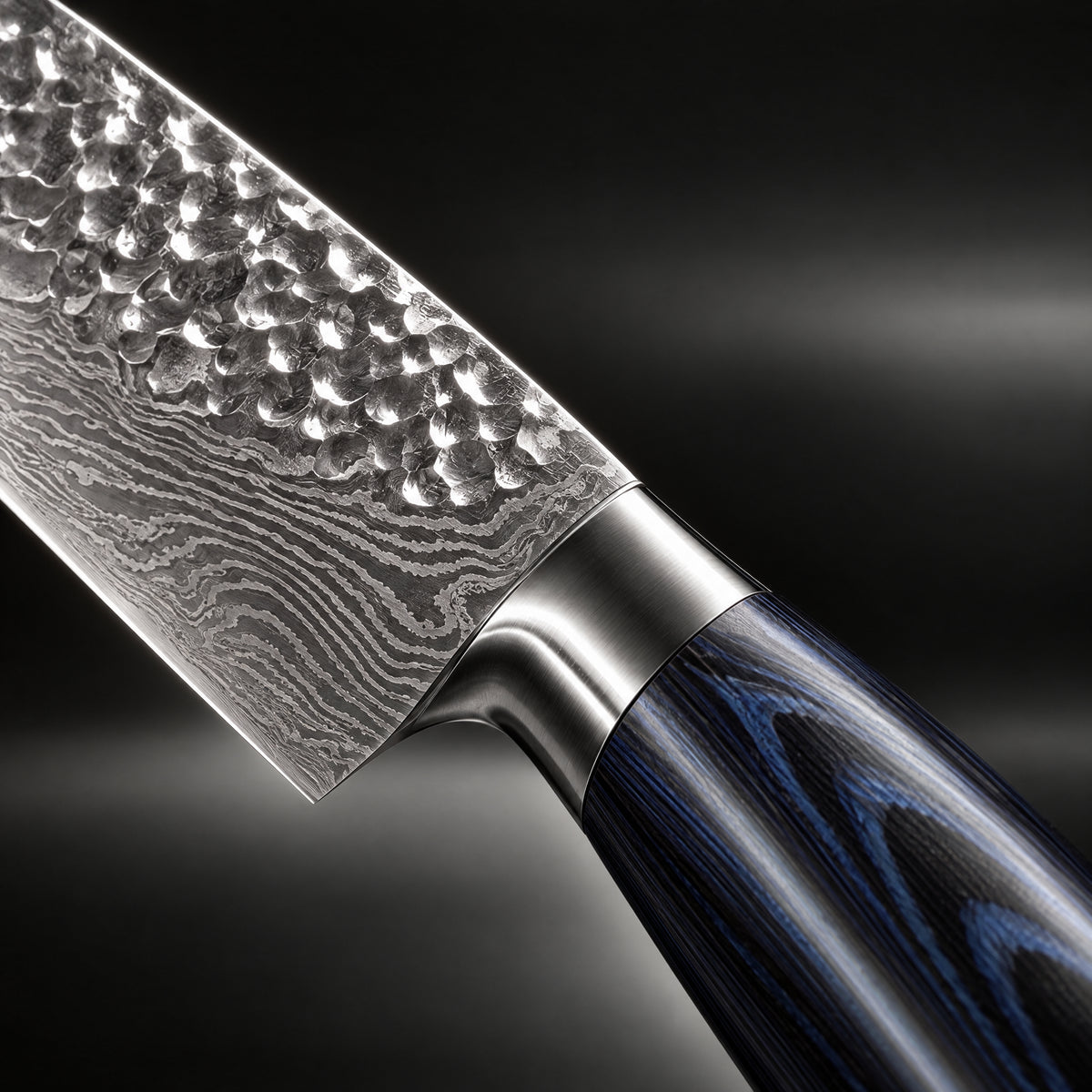 Close-up of the genkai 2-piece knife set (gyuto & santoku) blade and handle