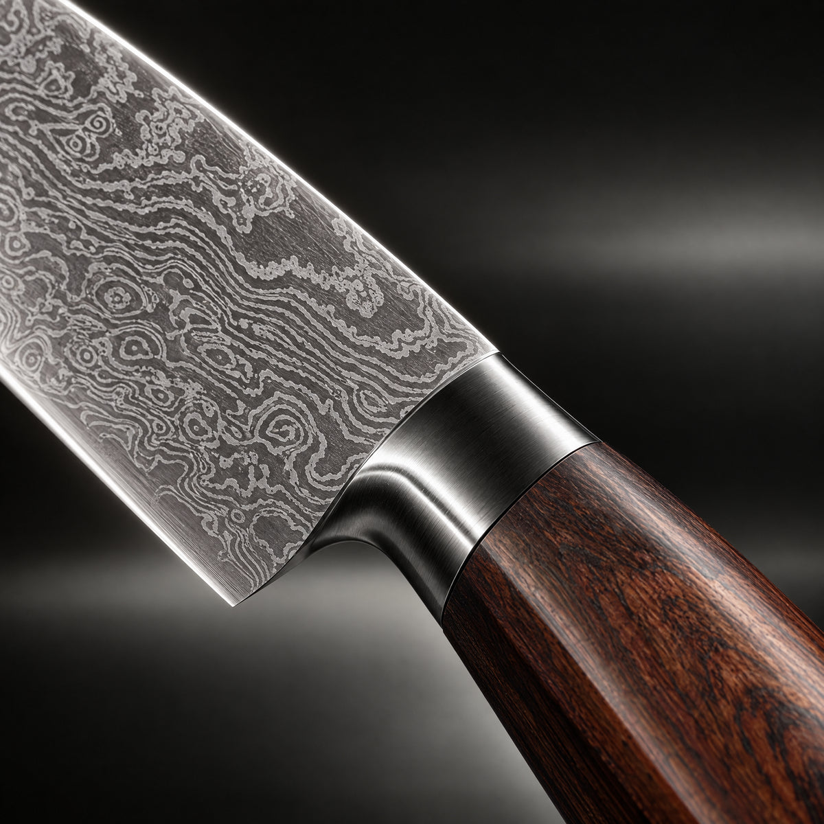 Close-up of the kenshin damascus knife set blade and handle