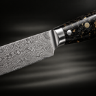 Close-up of the kogane steak knife blade and handle