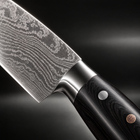 Close-up of the guren damascus knife set blade and handle