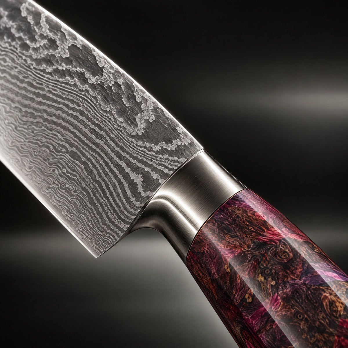 Close-up of the retsu damascus knife set blade and handle
