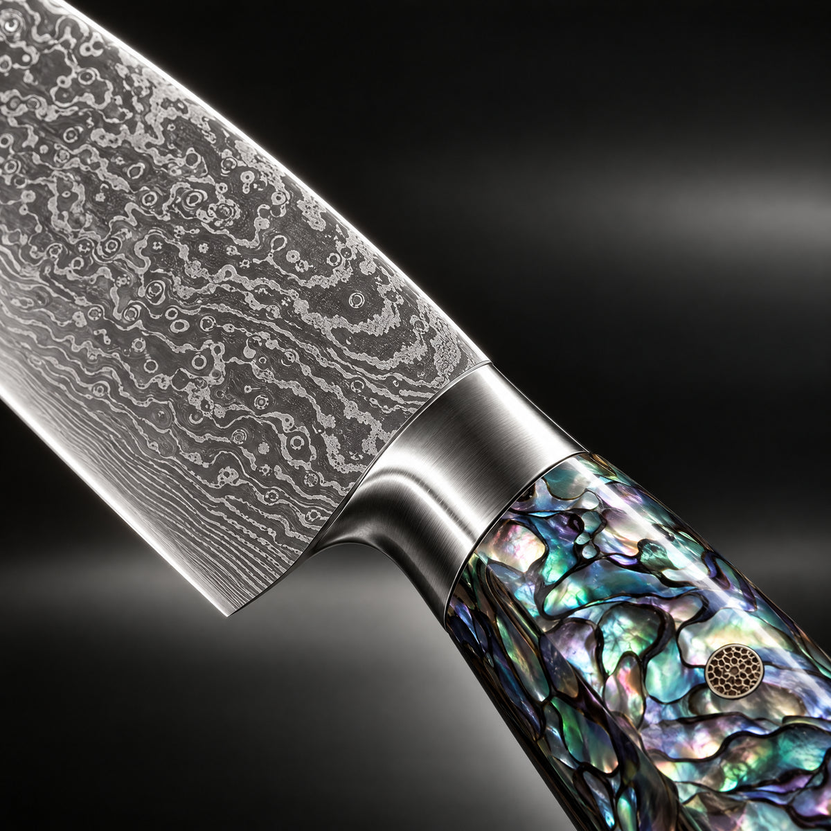 Close-up of the ryujin damascus knife set blade and handle