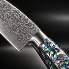 Close-up of the ryujin damascus knife set blade and handle