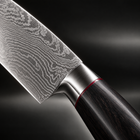 Close-up of the kurogane 2-piece knife set (santoku & petty) blade and handle