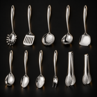 Okura 11-piece utensil set: nine utensils and two complete serving tongs, black studio