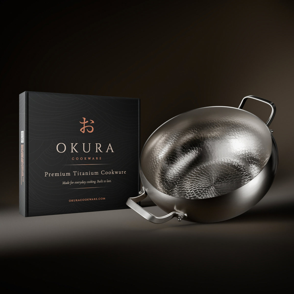 Okura deep titanium pot next to the Okura gift box