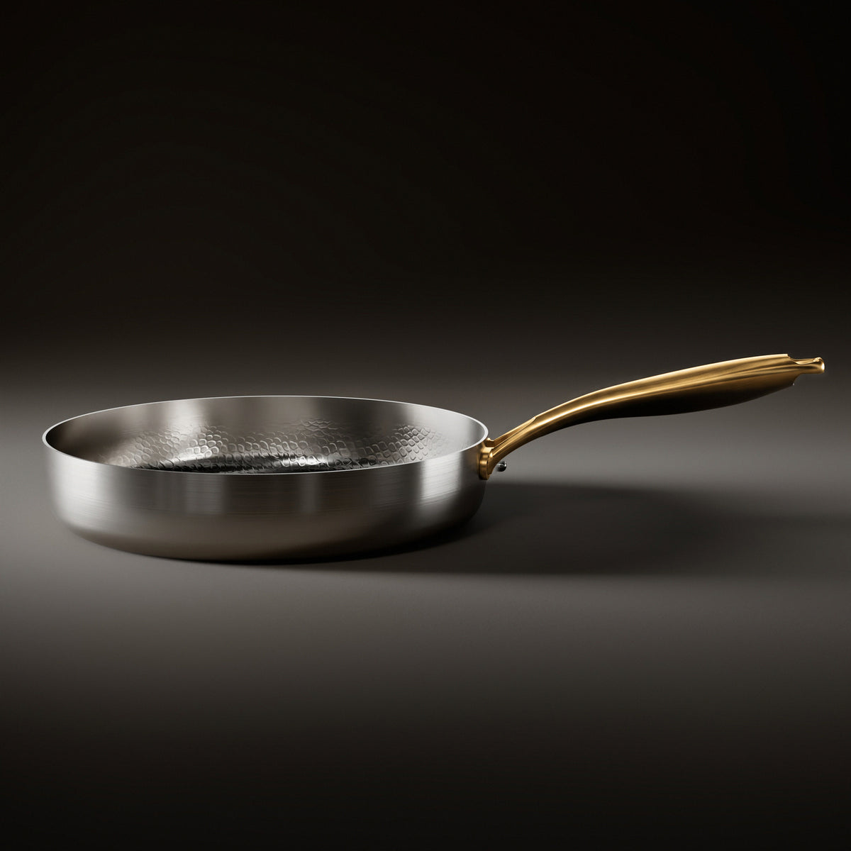 Side view of the Okura high-wall titanium pan, Limited Edition with gold-coloured handle