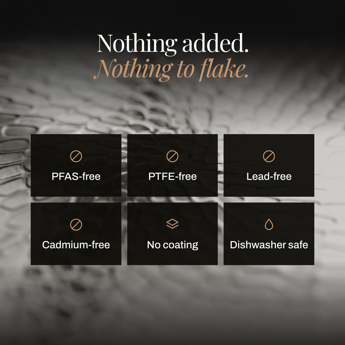 Nothing added, nothing to flake: close-up of the uncoated hammered titanium surface. PFAS-free, PTFE-free, lead-free, cadmium-free, no coating, dishwasher safe