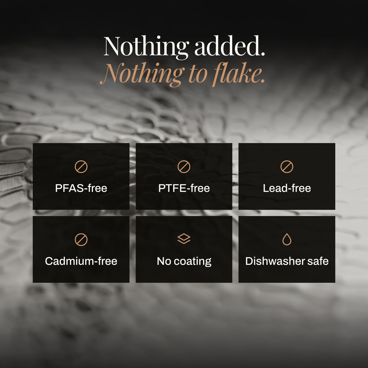 Nothing added, nothing to flake: close-up of the uncoated hammered titanium surface. PFAS-free, PTFE-free, lead-free, cadmium-free, no coating, dishwasher safe