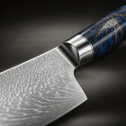 Close-up of the japanese-style hammered chef’s knife blade and handle