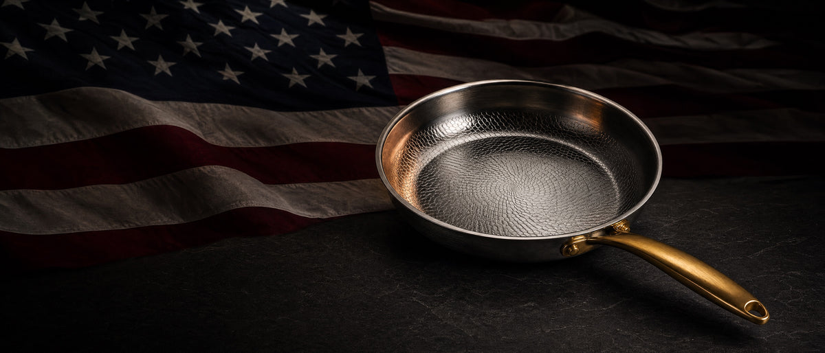 Okura Labor Day Sale — hand-hammered titanium pan on a dark American flag