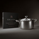 Okura titanium cooking pot next to the Okura gift box