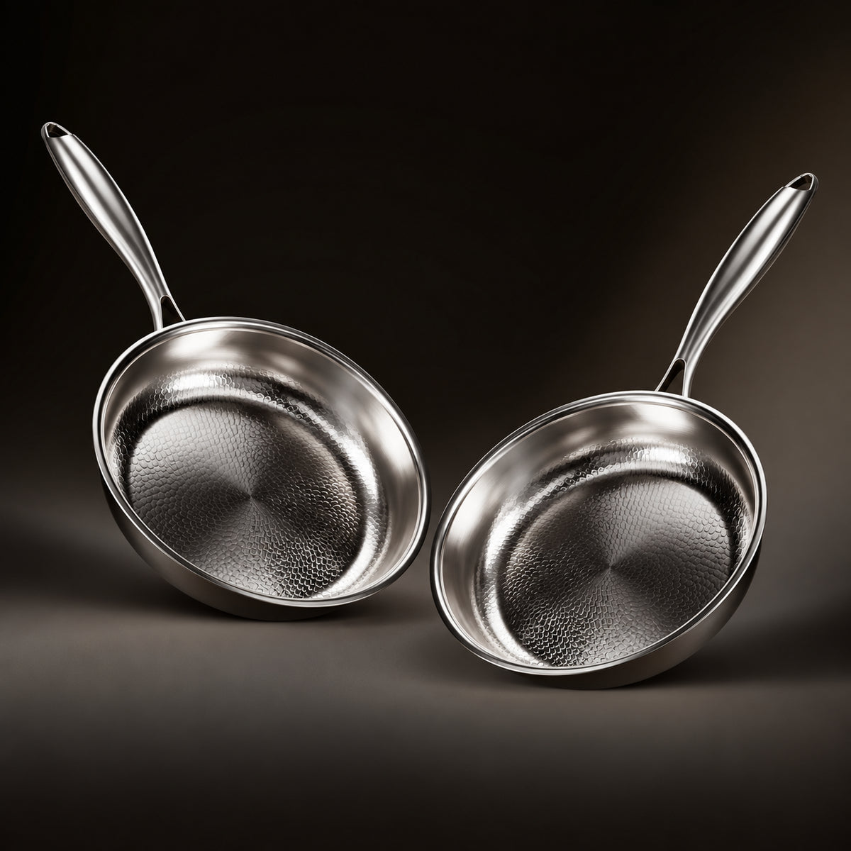 Two identical same-size Okura hammered titanium pans