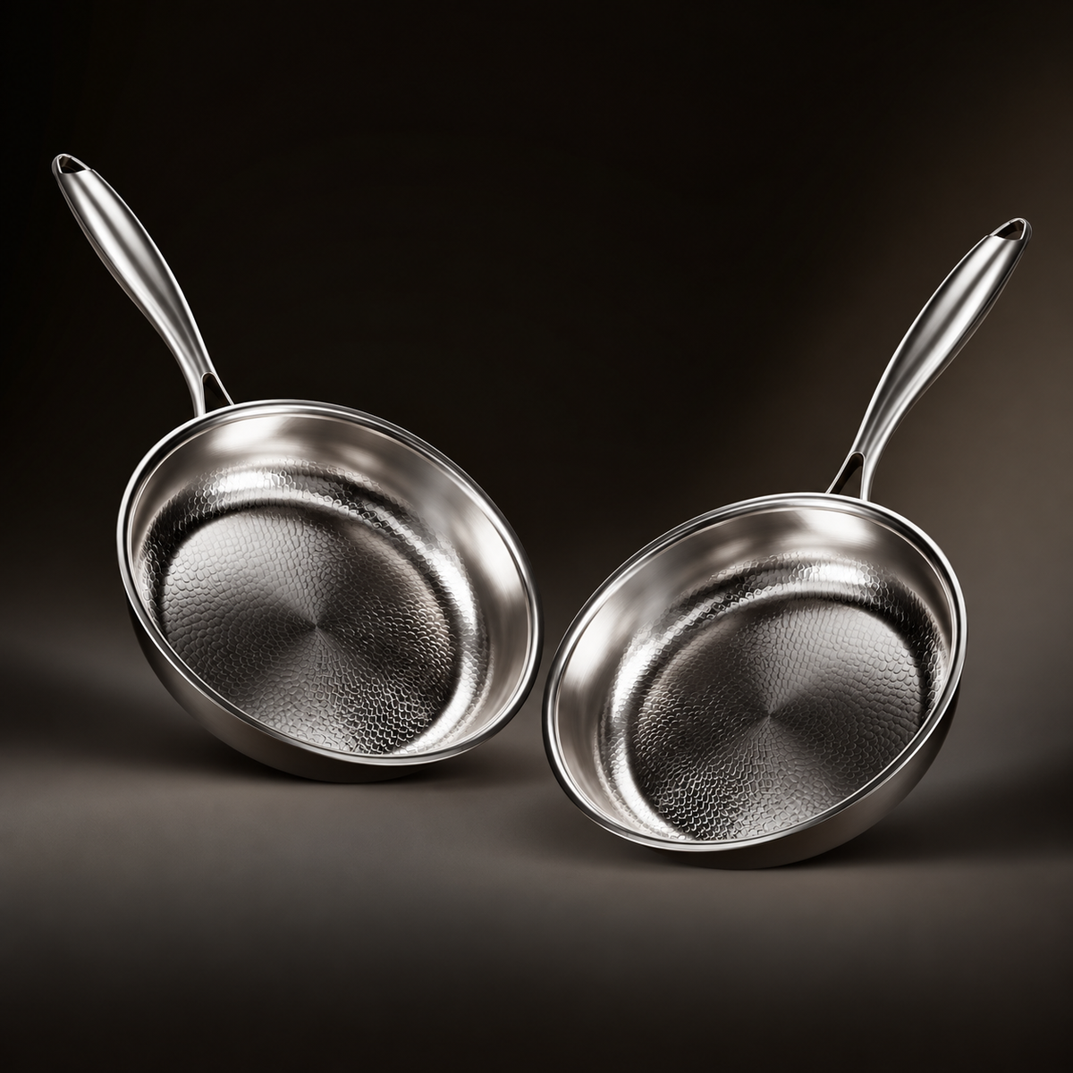 Two identical same-size Okura hammered titanium pans