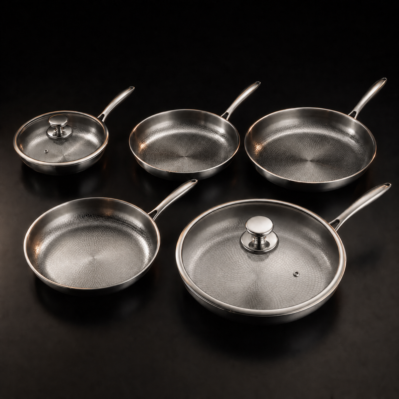 Hand-hammered titanium frying pan bundle of five sizes with two lids, PFAS-free by Okura