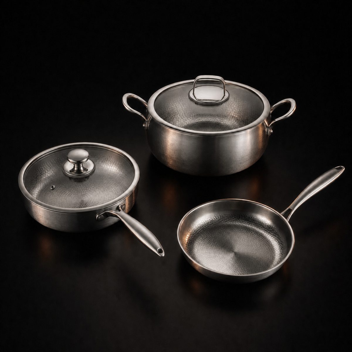 Hand-hammered titanium premium cooking set of three pans with two lids, PFAS-free by Okura