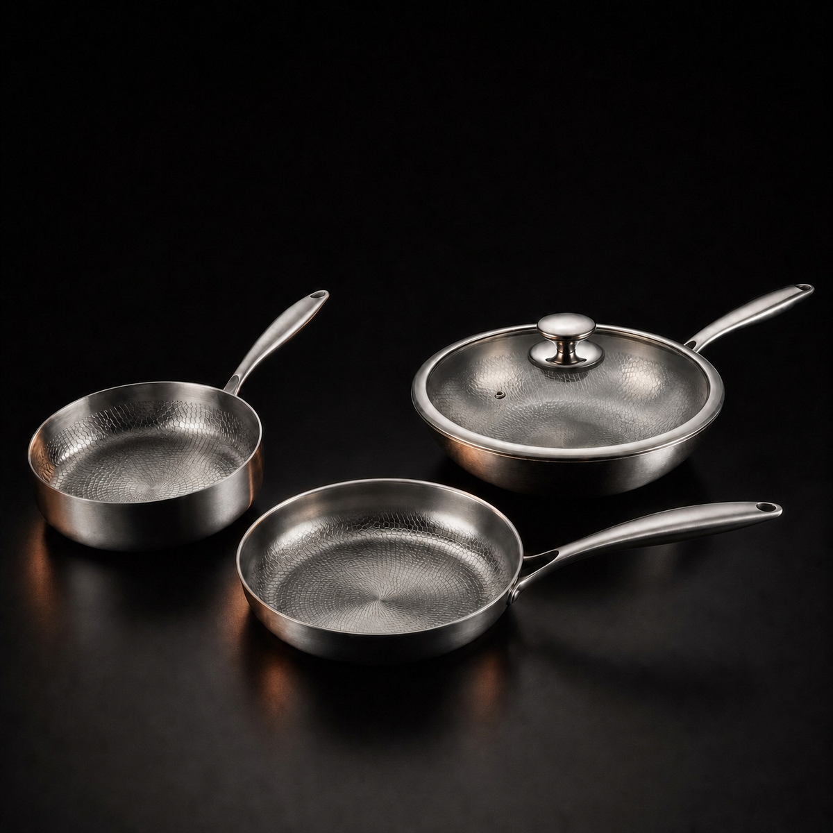 Hand-hammered titanium stir-fry set of three pans with a lid, PFAS-free by Okura